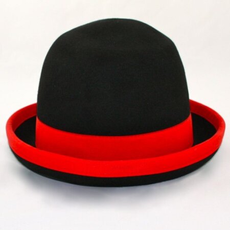 Juggling bowler hat Juggle Dream black hat and red ribbon outside 59